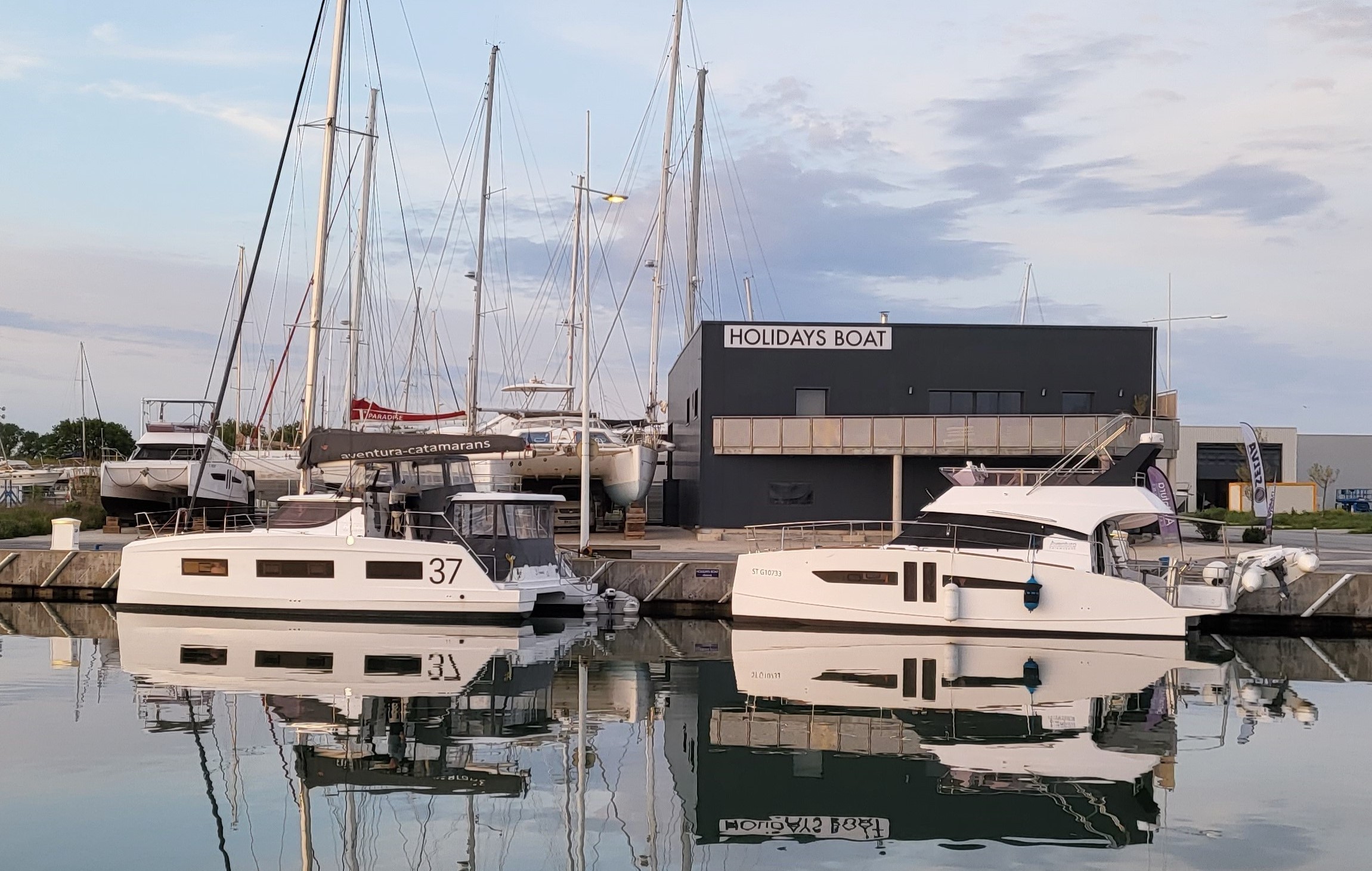Sailing and power aventura catamarans