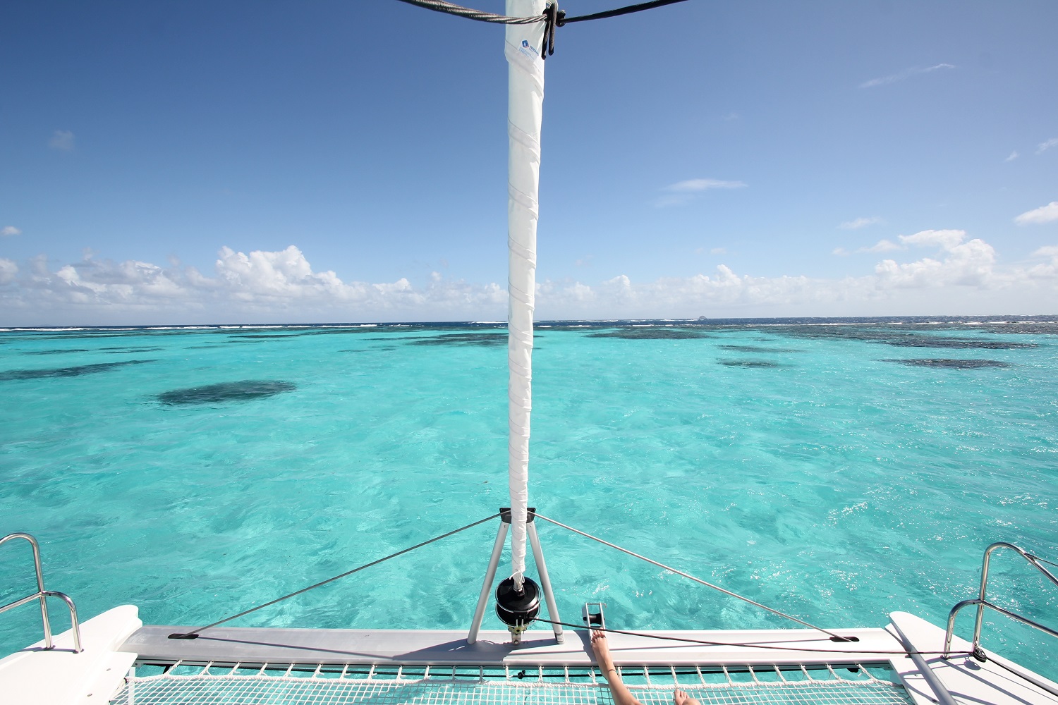 Sailing crystal blue water